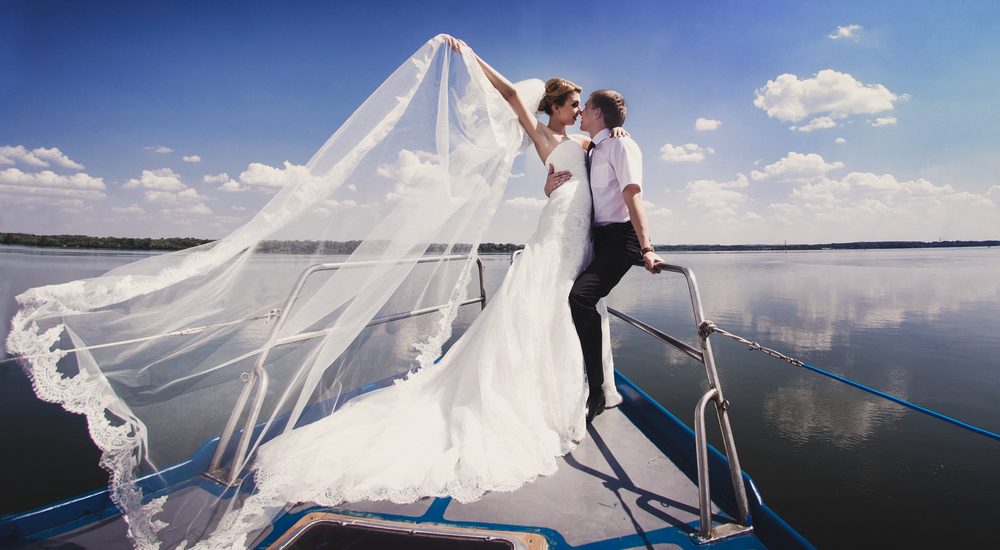 boat wedding ideas a person standing in front of water