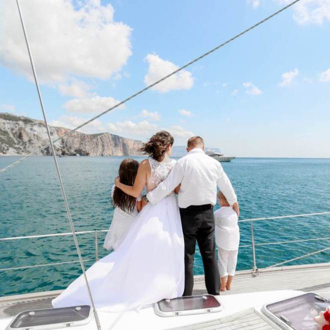 a person standing on a boat in the water