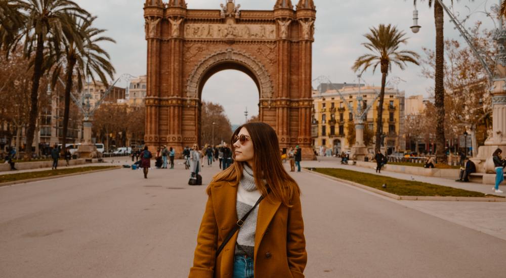 barcelona in november a person standing in front of a building