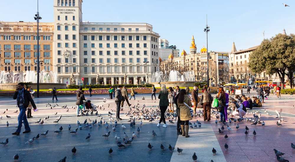 a group of people walking down the street