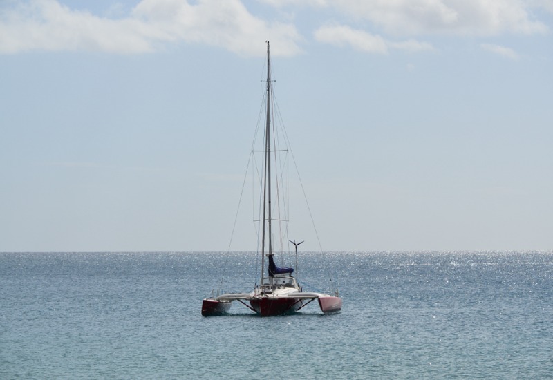 a small boat in a large body of water