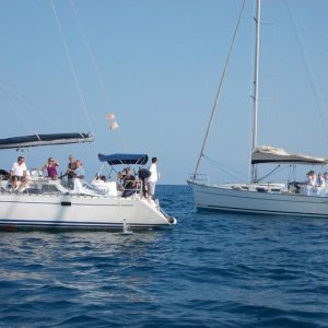 a small boat in a large body of water