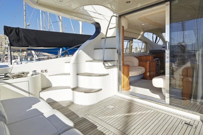 a chair sitting in front of a building