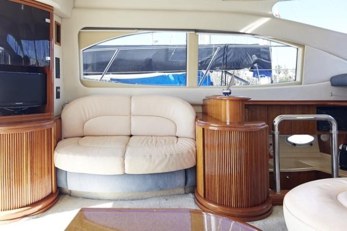 a chair sitting in front of a window