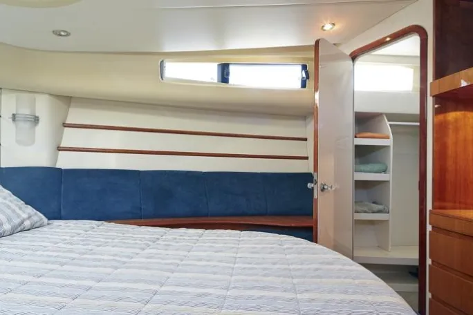 a bedroom with a bed in a room