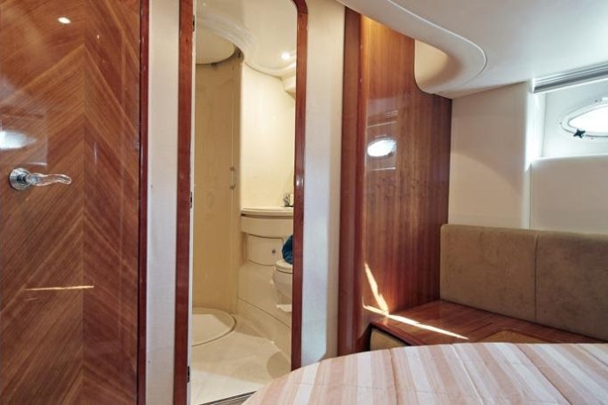 a bedroom with a large mirror