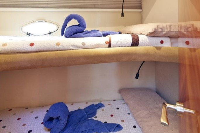 a bedroom with a bed in a room