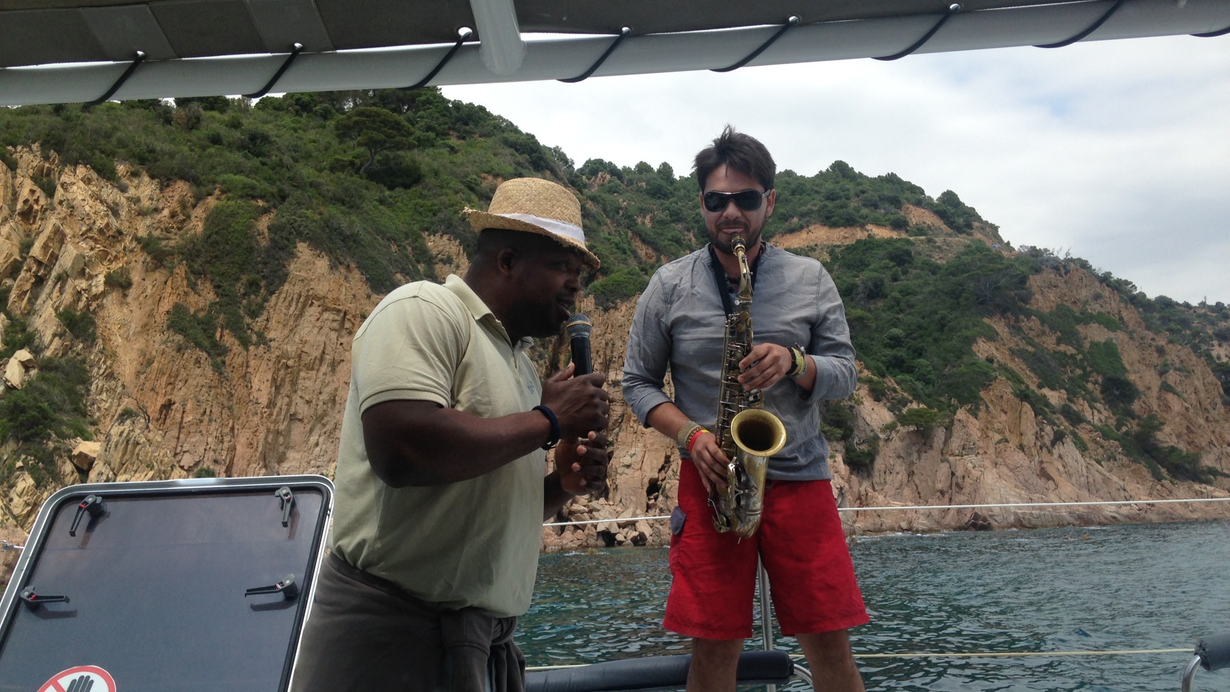 a man standing on a boat in the water