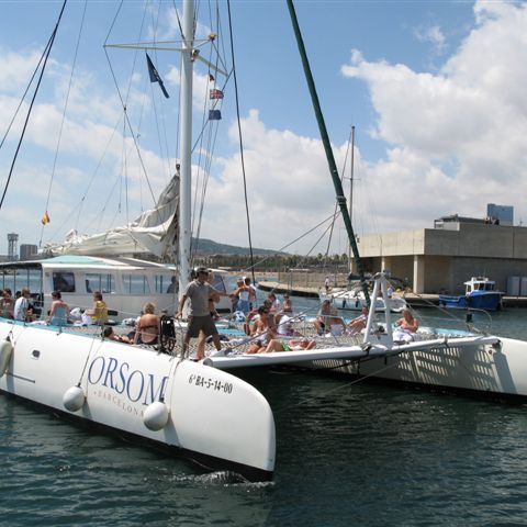 a boat is docked next to a body of water
