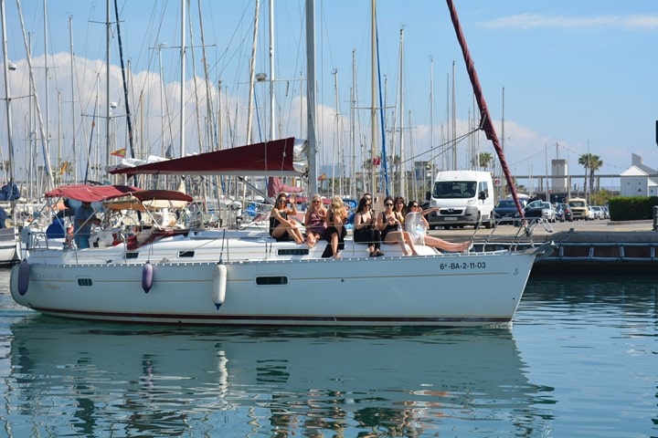 a boat is docked next to a body of water