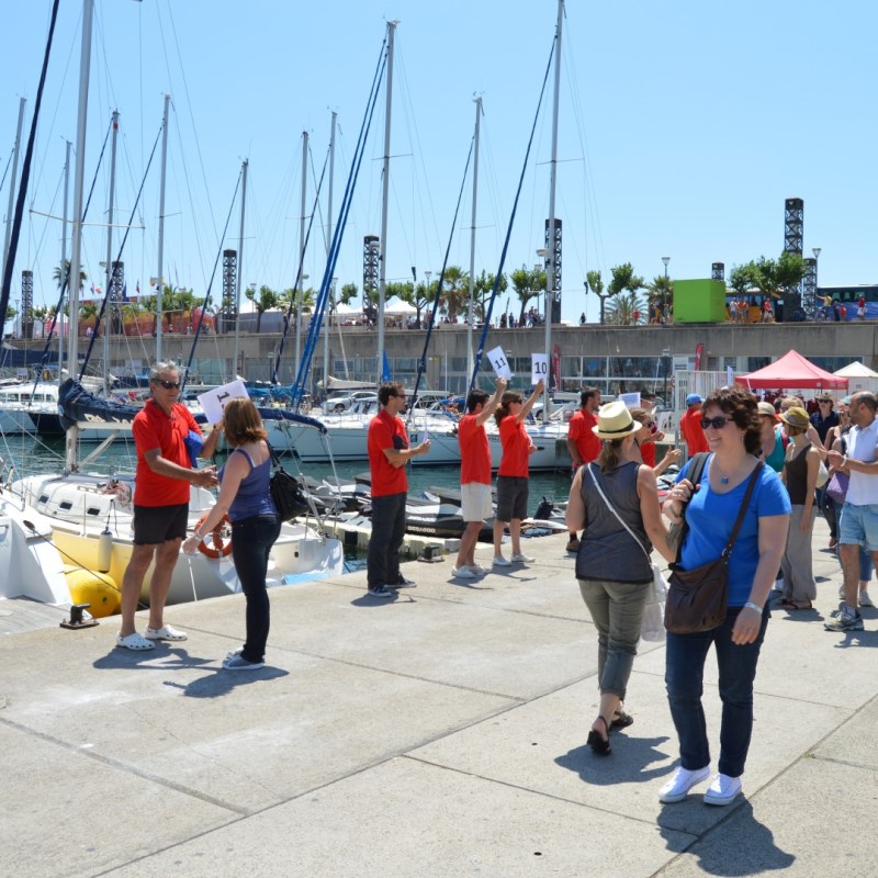 a group of people walking down the street