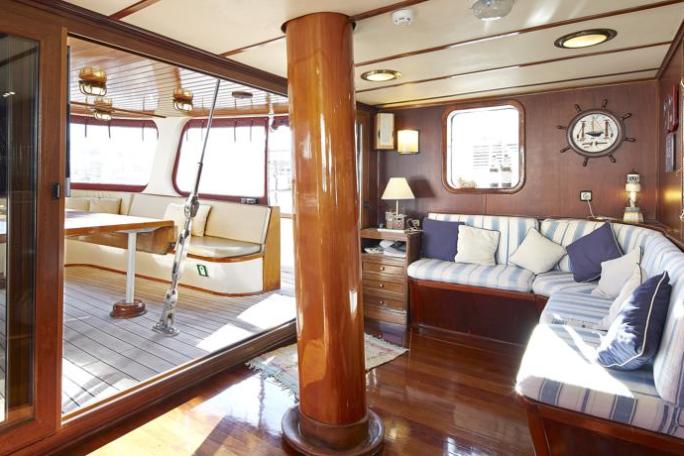 a room filled with furniture and a large window