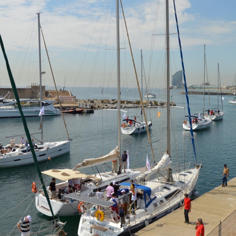 a boat is docked next to a body of water