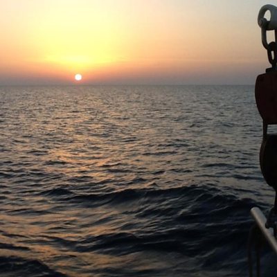 a sunset over a body of water