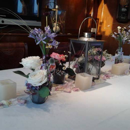 a vase of flowers on a table