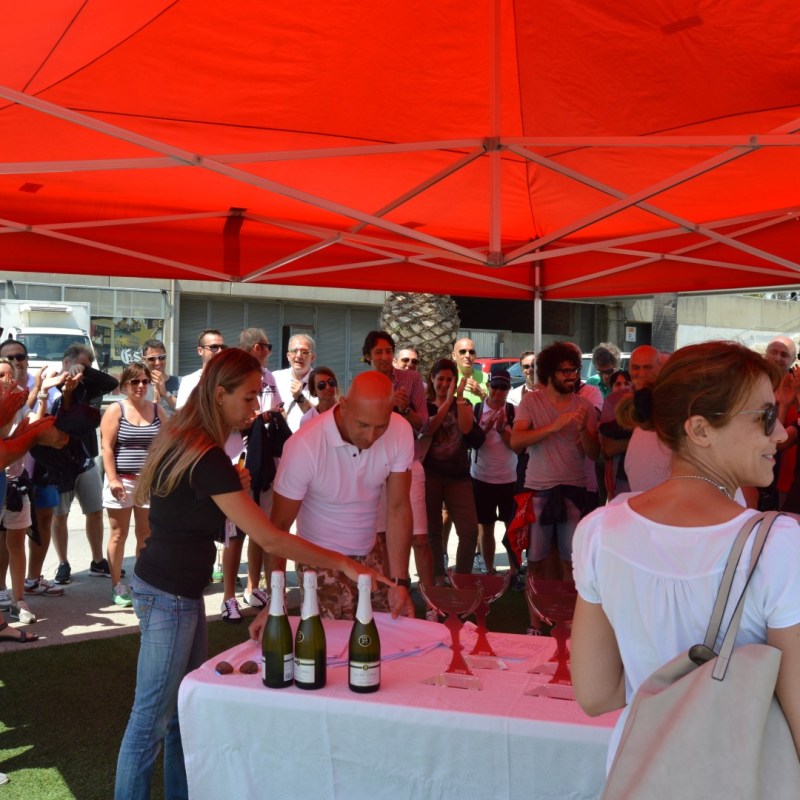 a group of people standing in front of a crowd