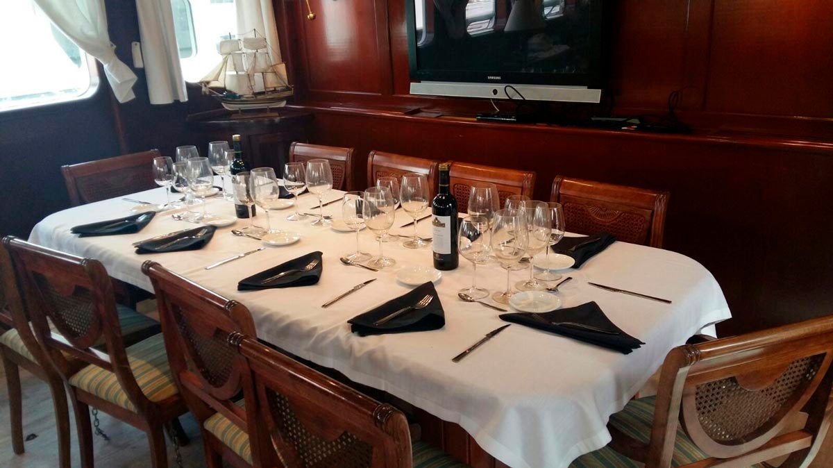 a kitchen with a table and chairs