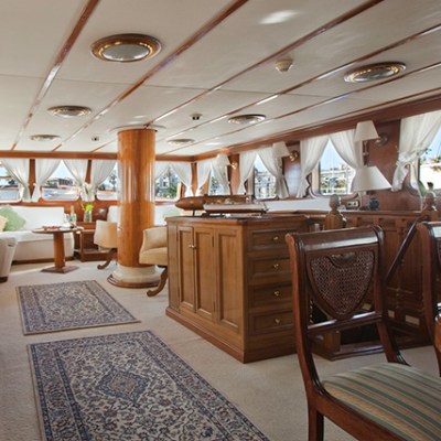 a room filled with furniture and a large window