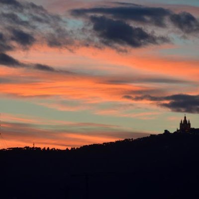 a sunset over a body of water
