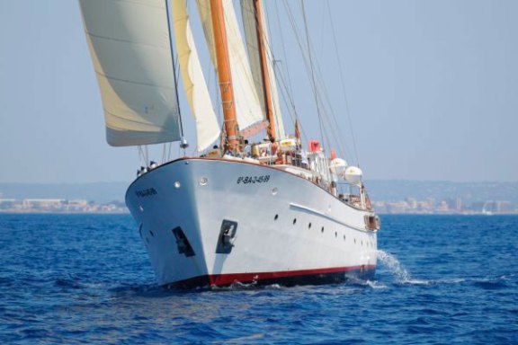 a small boat in a large body of water