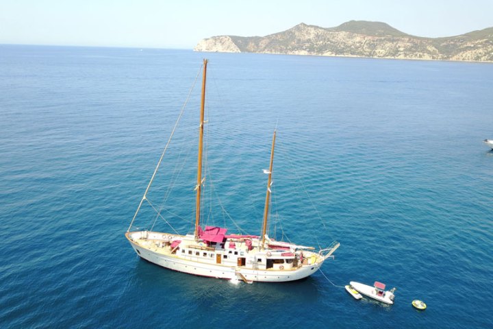 a small boat in a body of water
