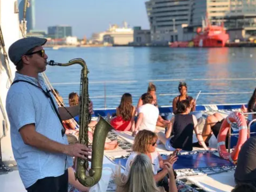 orsomsaxo a group of people on a boat in the water