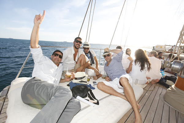 activities on a boat a group of people sitting at a dock