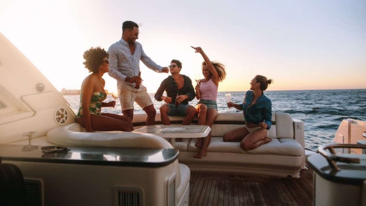 a couple of people that are sitting in the water