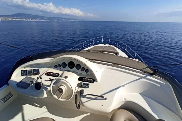 a boat parked next to a body of water