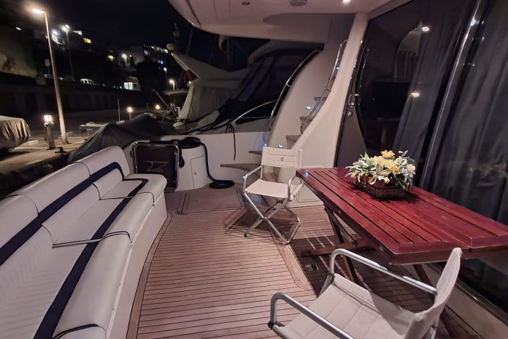 a bedroom with a bed and a chair in a room