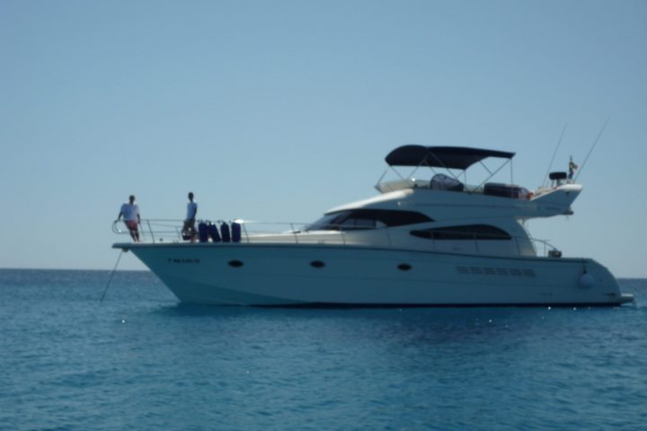 a small boat in a large body of water
