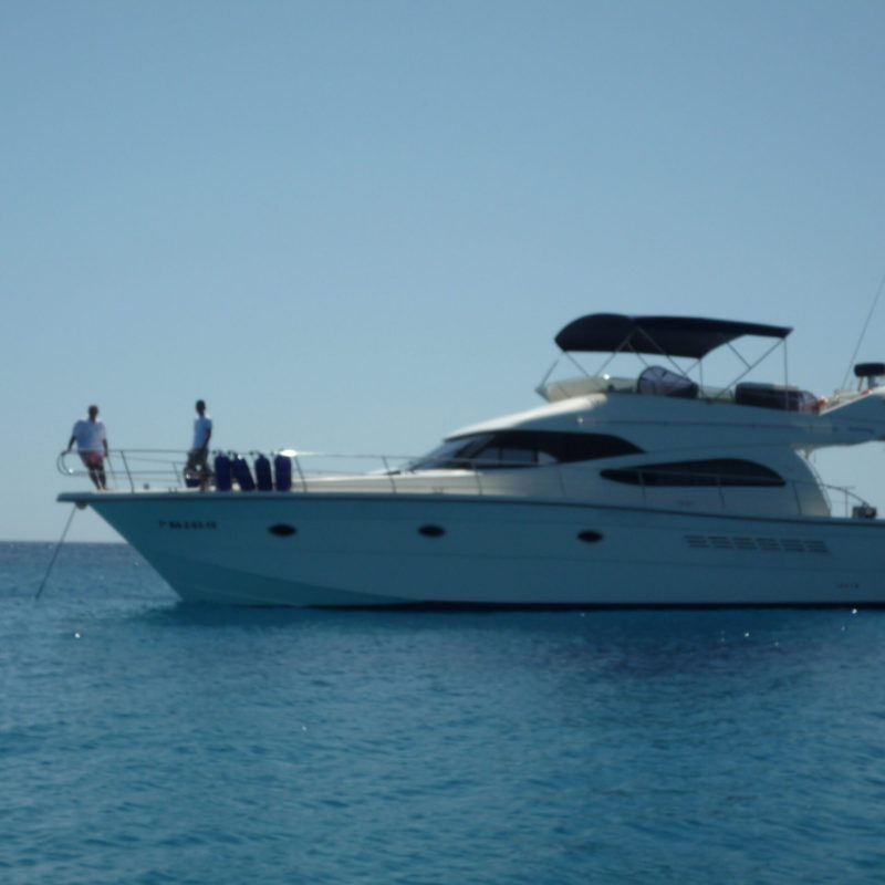 a small boat in a large body of water